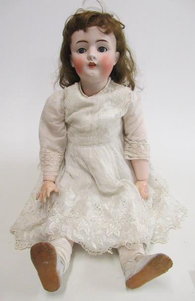 A bisque socket head doll Image