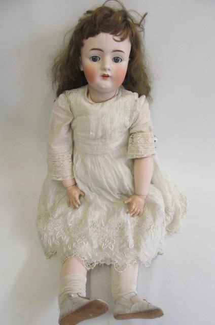 A bisque socket head doll Image