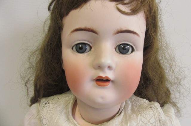 A bisque socket head doll Image