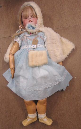 A large Simon & Halbig bisque socket head doll with blue glass sleeping eyes Image