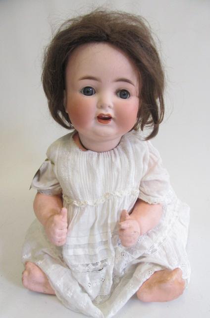 A Heubach Koppelsdorf bisque socket head character doll with blue glass sleeping eyes Image