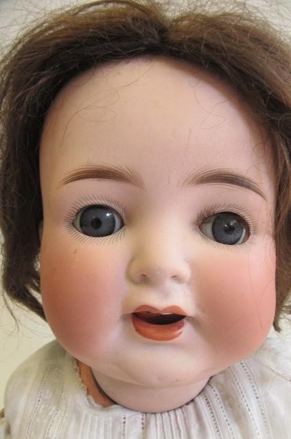 A Heubach Koppelsdorf bisque socket head character doll with blue glass sleeping eyes Image