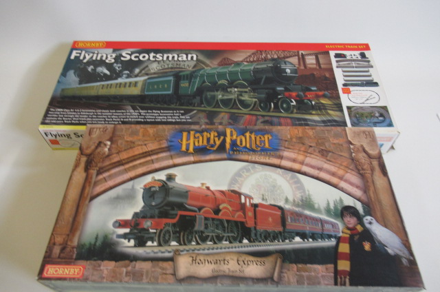 Hornby R1019 Flying Scotsman Train Set and Harry Potter and the Philosophers Stone Train Set Image
