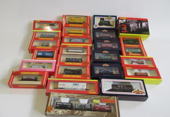 Twenty seven goods wagons by Hornby and Bachmann including coal trucks Image