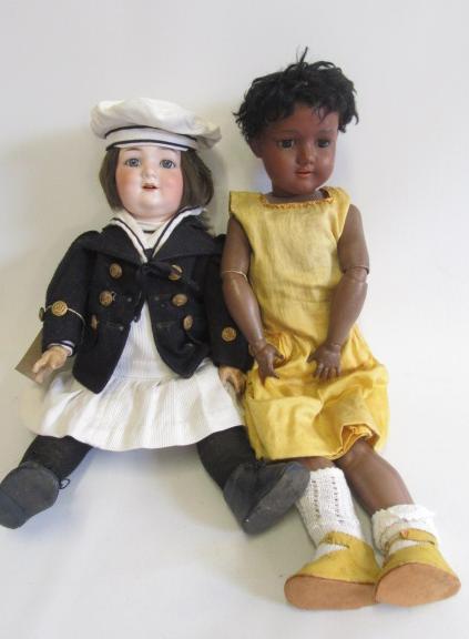 An Armand Marseille bisque socket head black doll Image