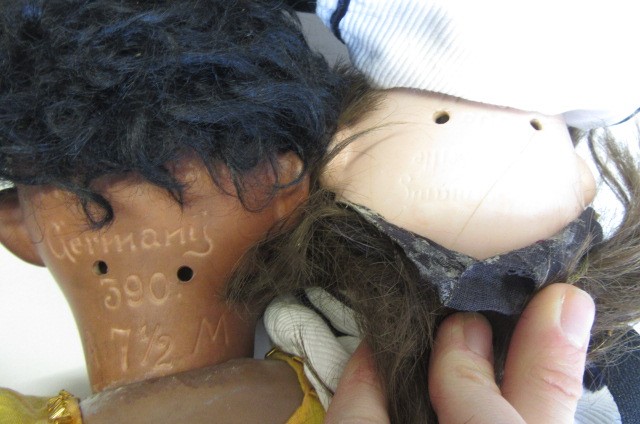 An Armand Marseille bisque socket head black doll Image