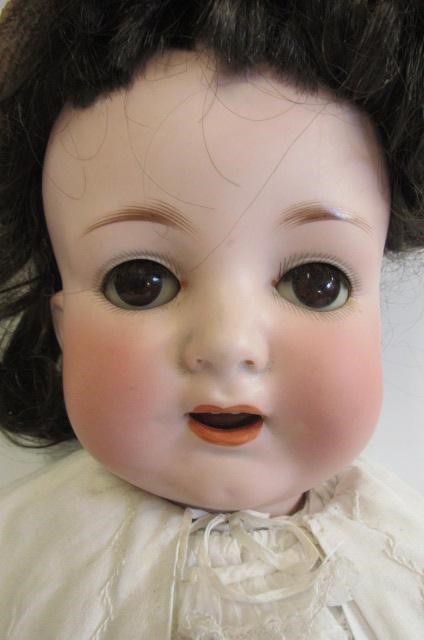 A Thuringer Puppen-Industrie bisque socket head character doll Image