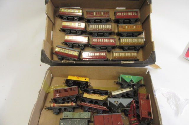 Hornby Trains rolling stock including passenger coaches and goods truck Image