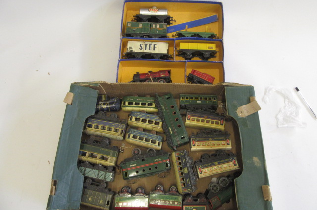 Playworn tinplate rolling stock by various makers including goods truck Image