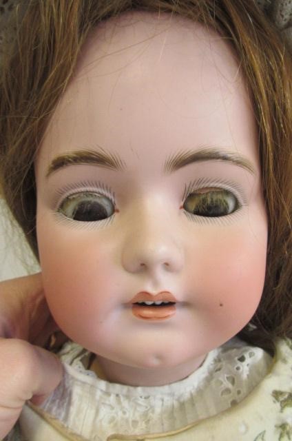 A Simon & Halbig bisque socket head doll Image