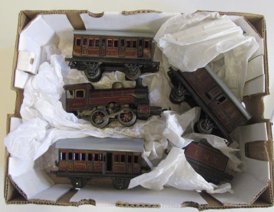 Bing 18v electric 0-4-0 L.M.S. locomotive 4492 with three 4-wheel coaches Image