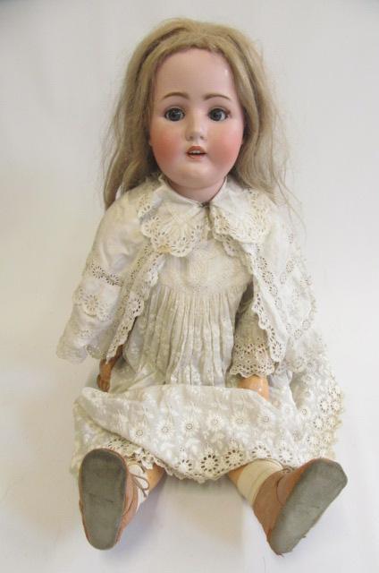 A Catterfelder Puppenfabrik bisque socket head doll with blue glass sleeping eyes Image