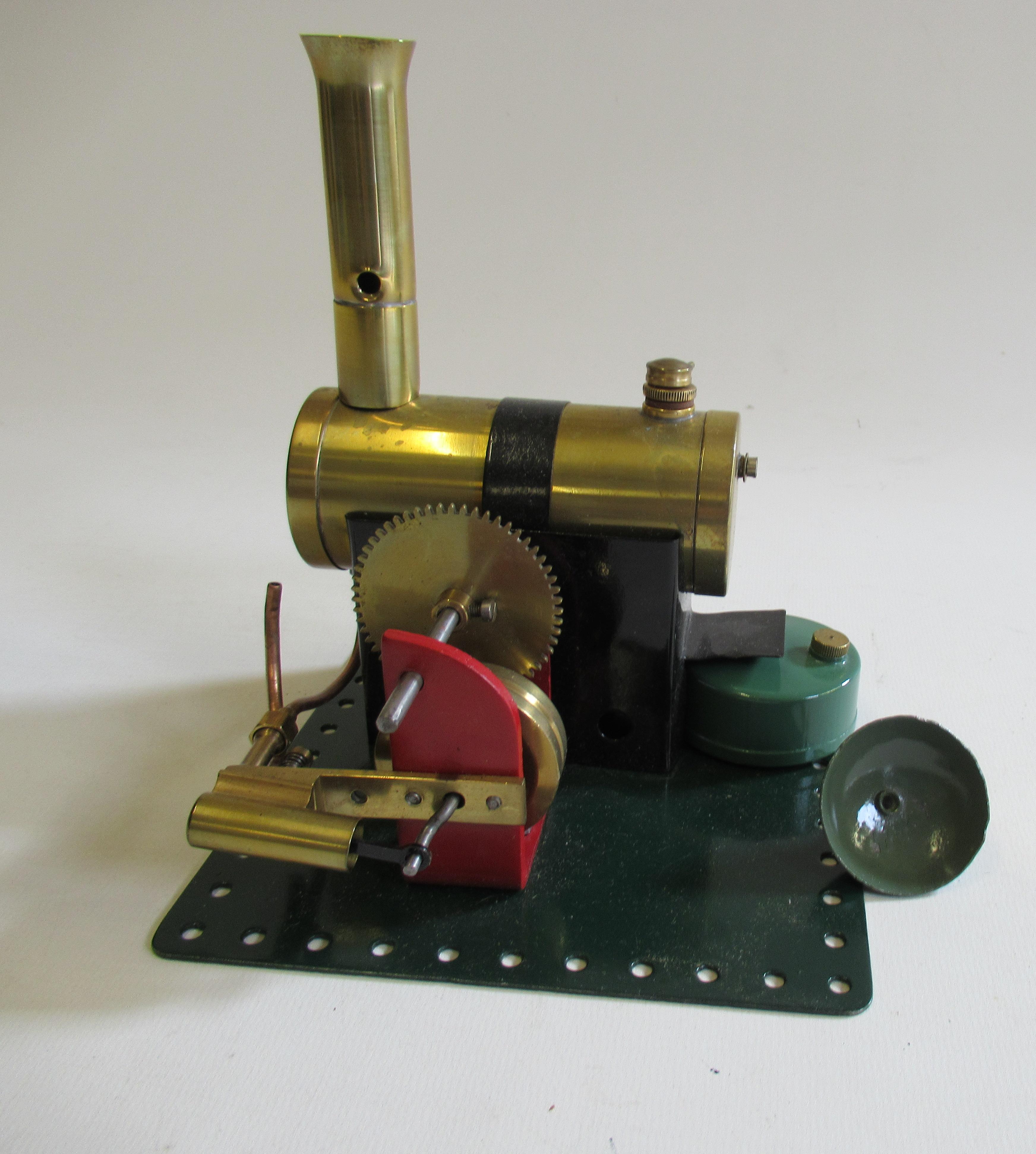 A Bowman spirit fired steam engine with single cylinder to geared drive Image