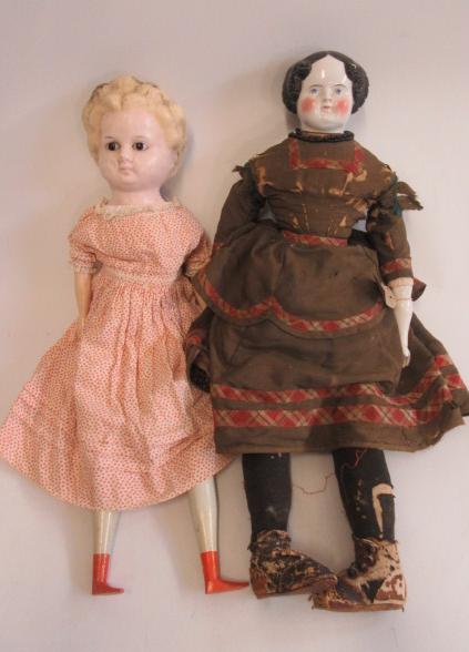 A moulded wax shoulder head doll Image