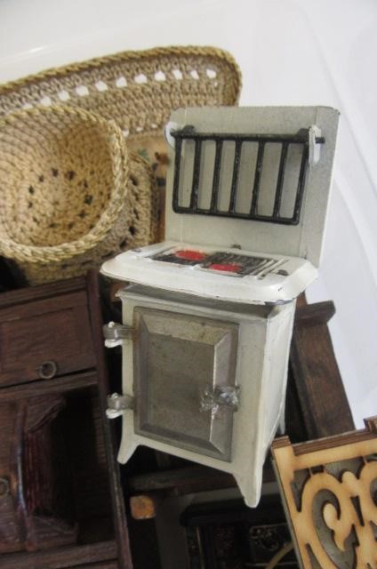 A collection of dolls house furniture Image