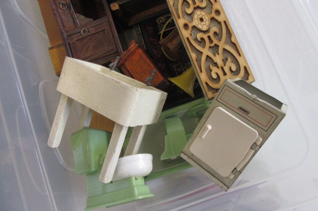 A collection of dolls house furniture Image