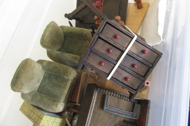 A collection of dolls house furniture Image