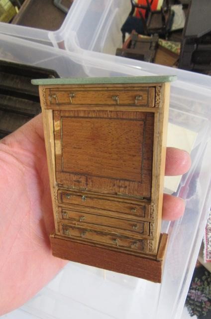 A collection of dolls house furniture Image