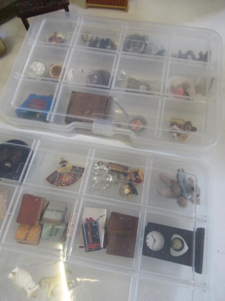 A collection of dolls house furniture Image