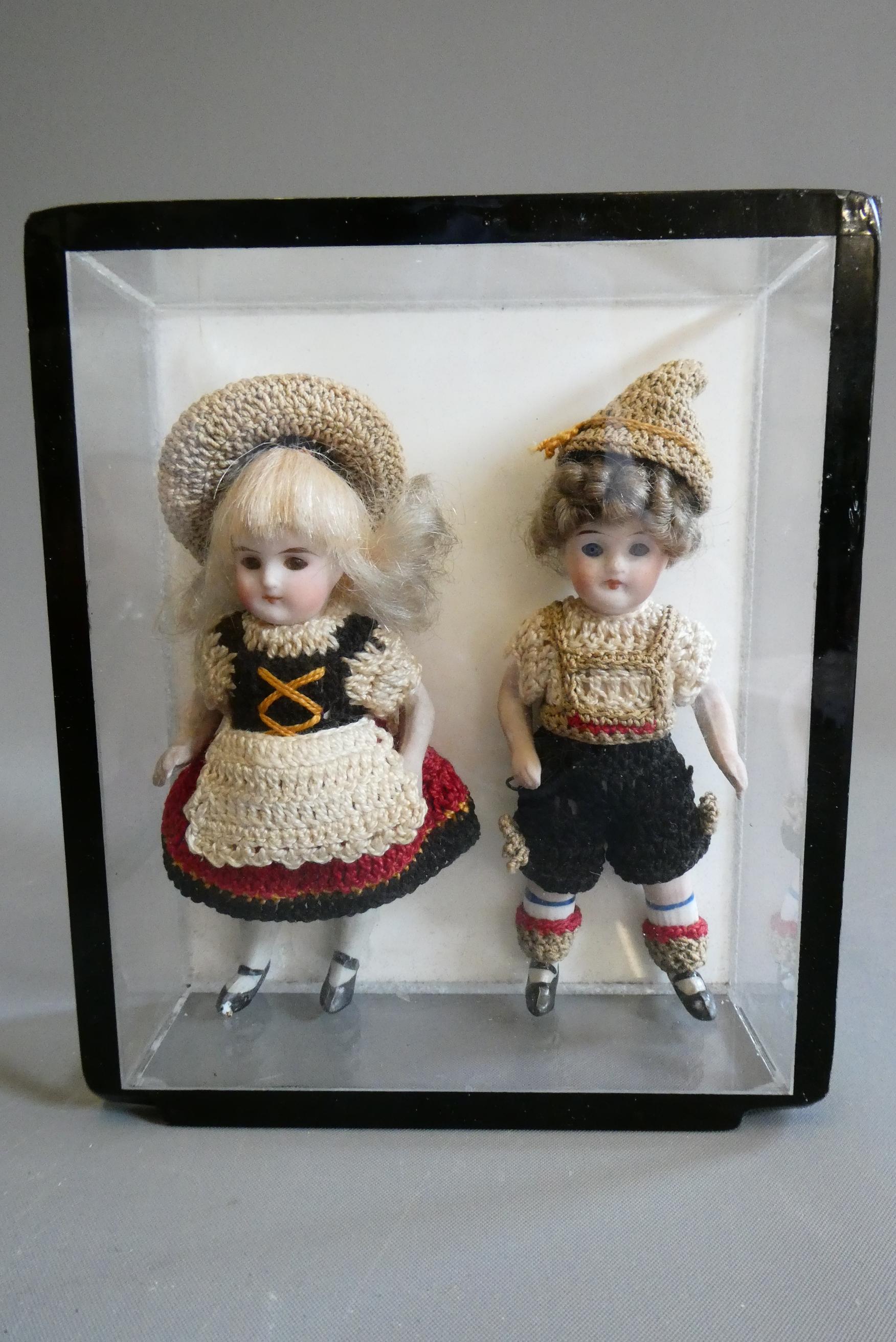 Two all bisque doll's house dolls Image