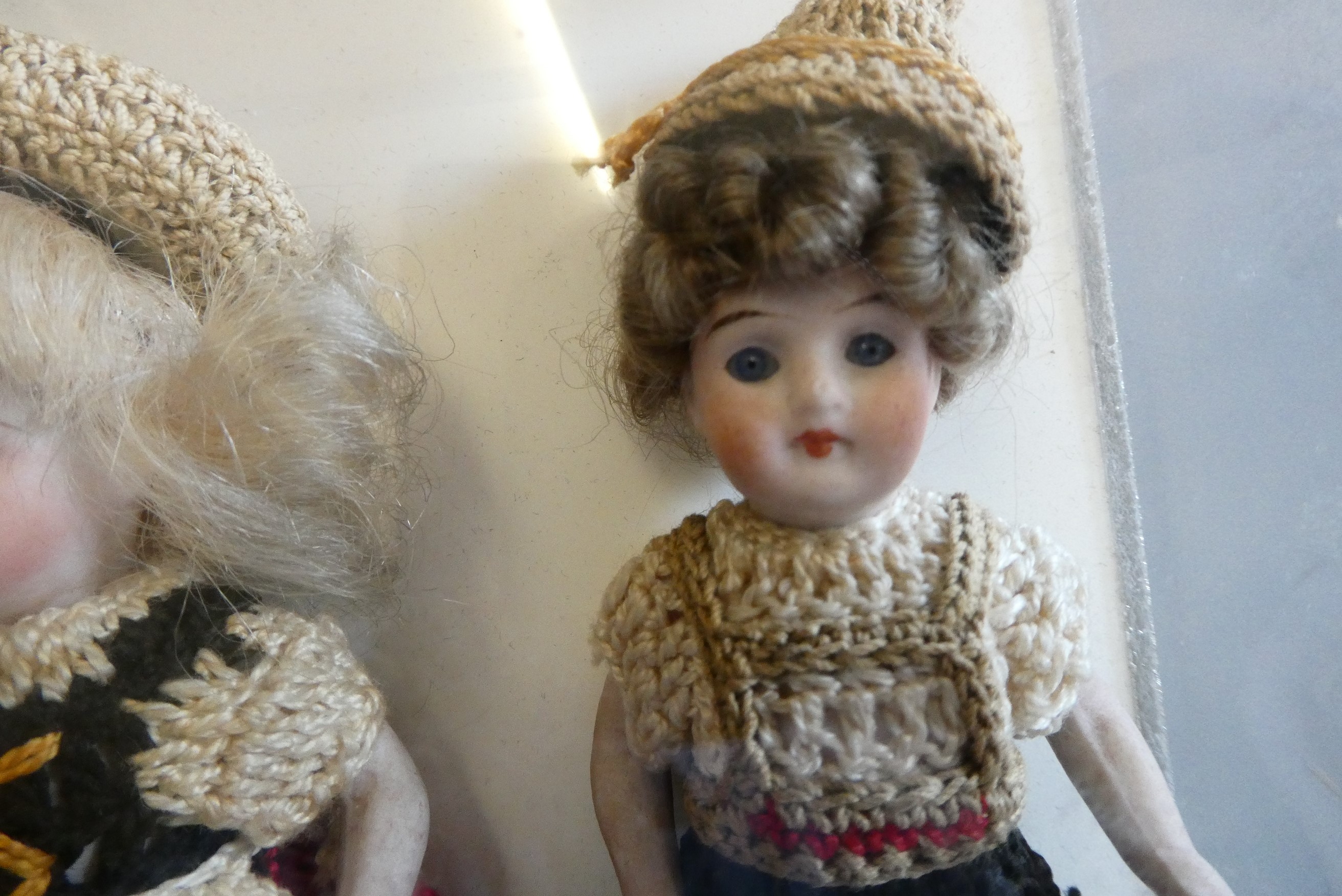 Two all bisque doll's house dolls Image