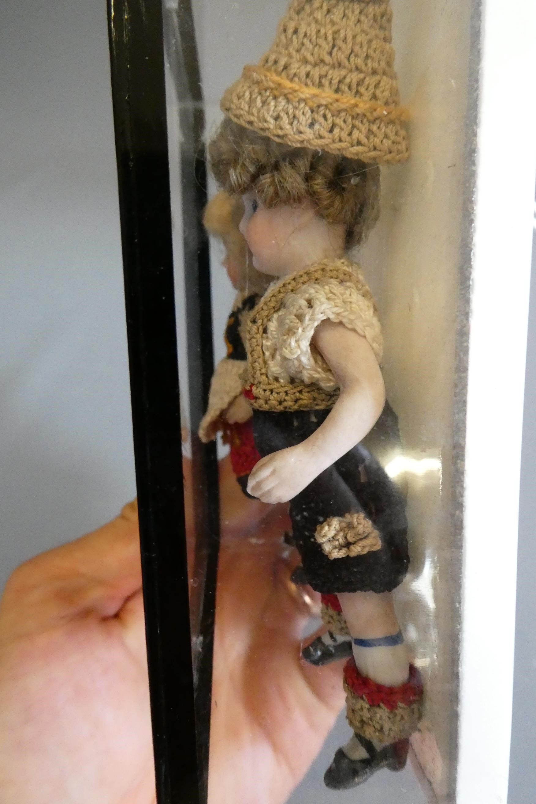 Two all bisque doll's house dolls Image