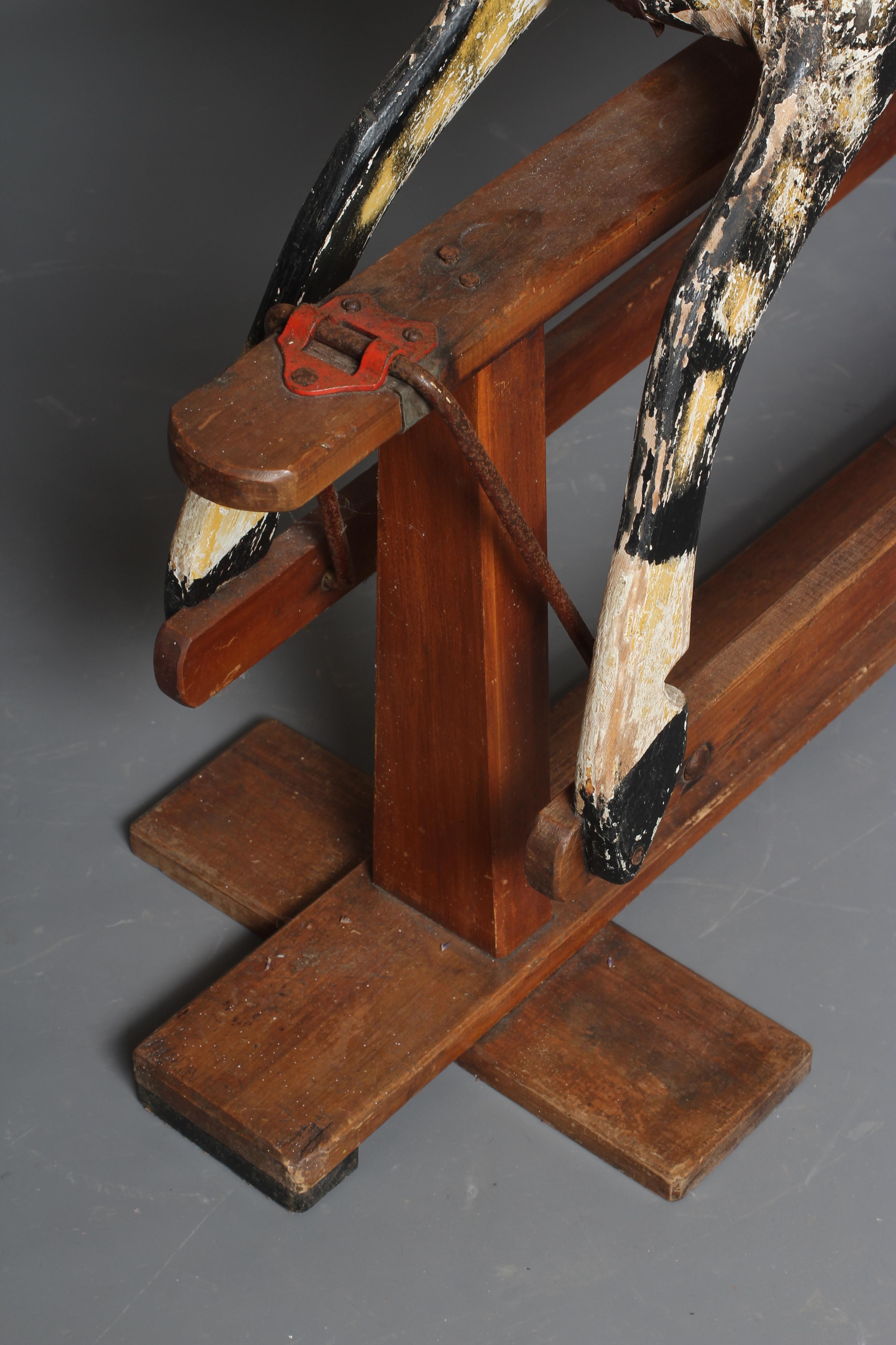 A dappled grey rocking horse Image