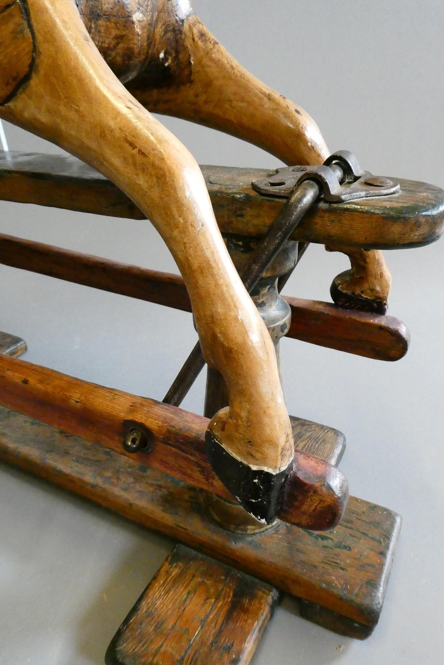 A doll's rocking horse Image
