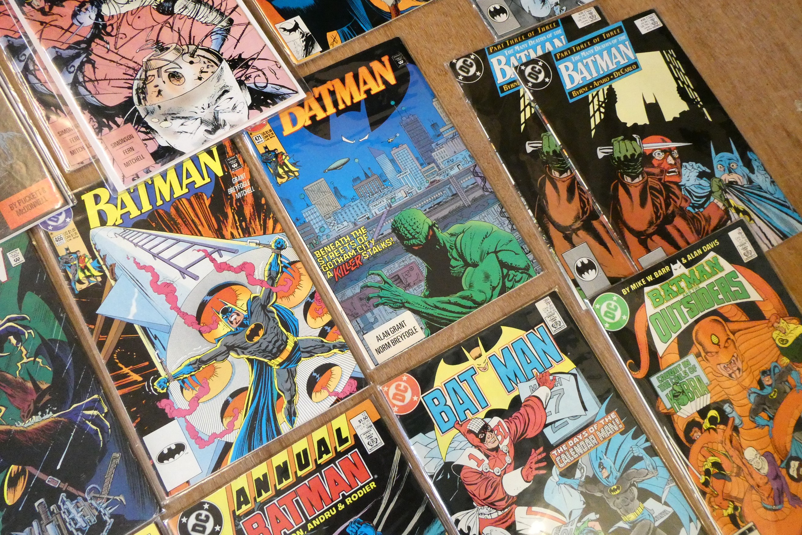 A collection of Batman DC comics Image
