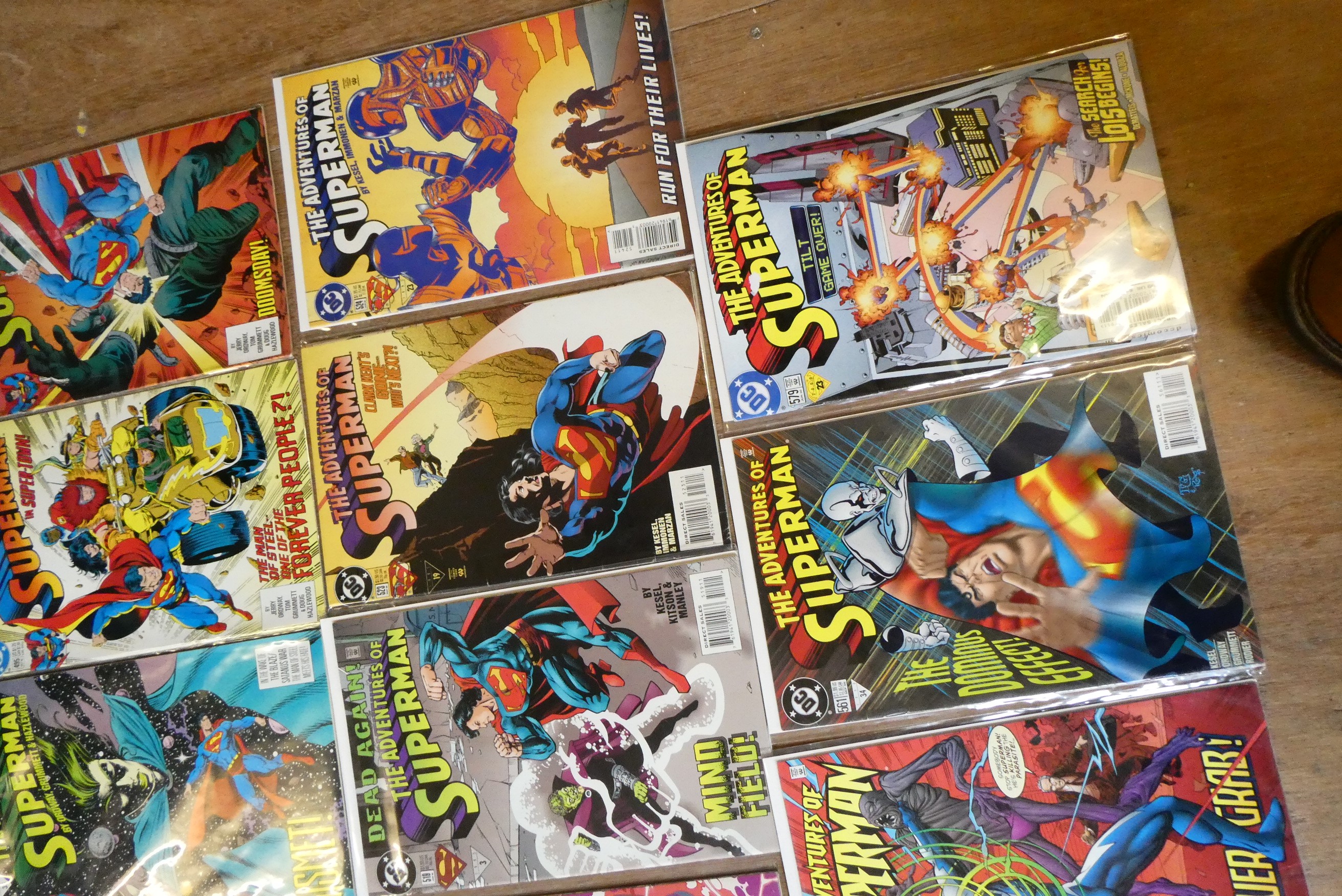 A collection of Superman DC comics Image