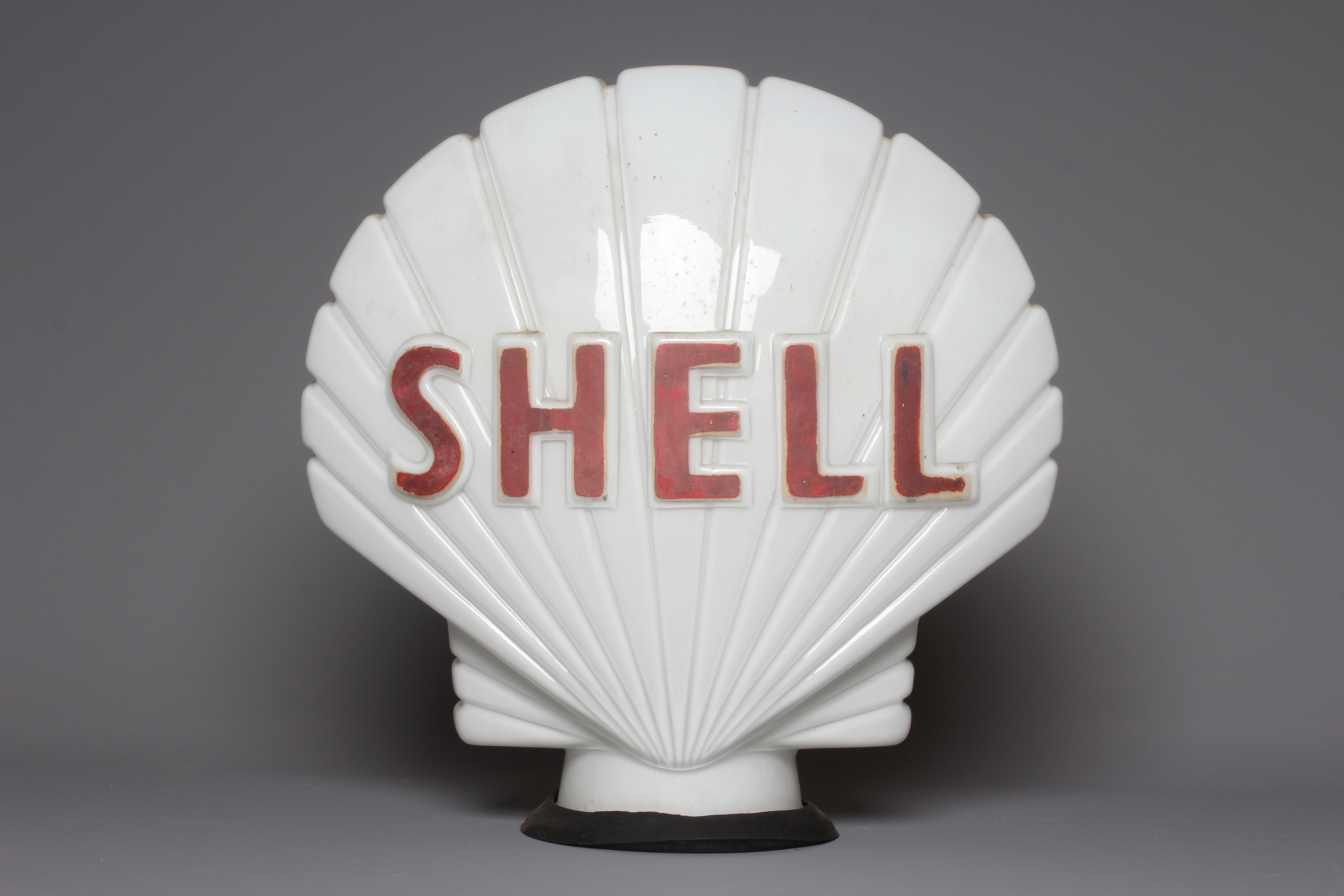 Shell petrol pump glass globe, of shell form with raised lettering, marked internally "PROPERTY OF Image