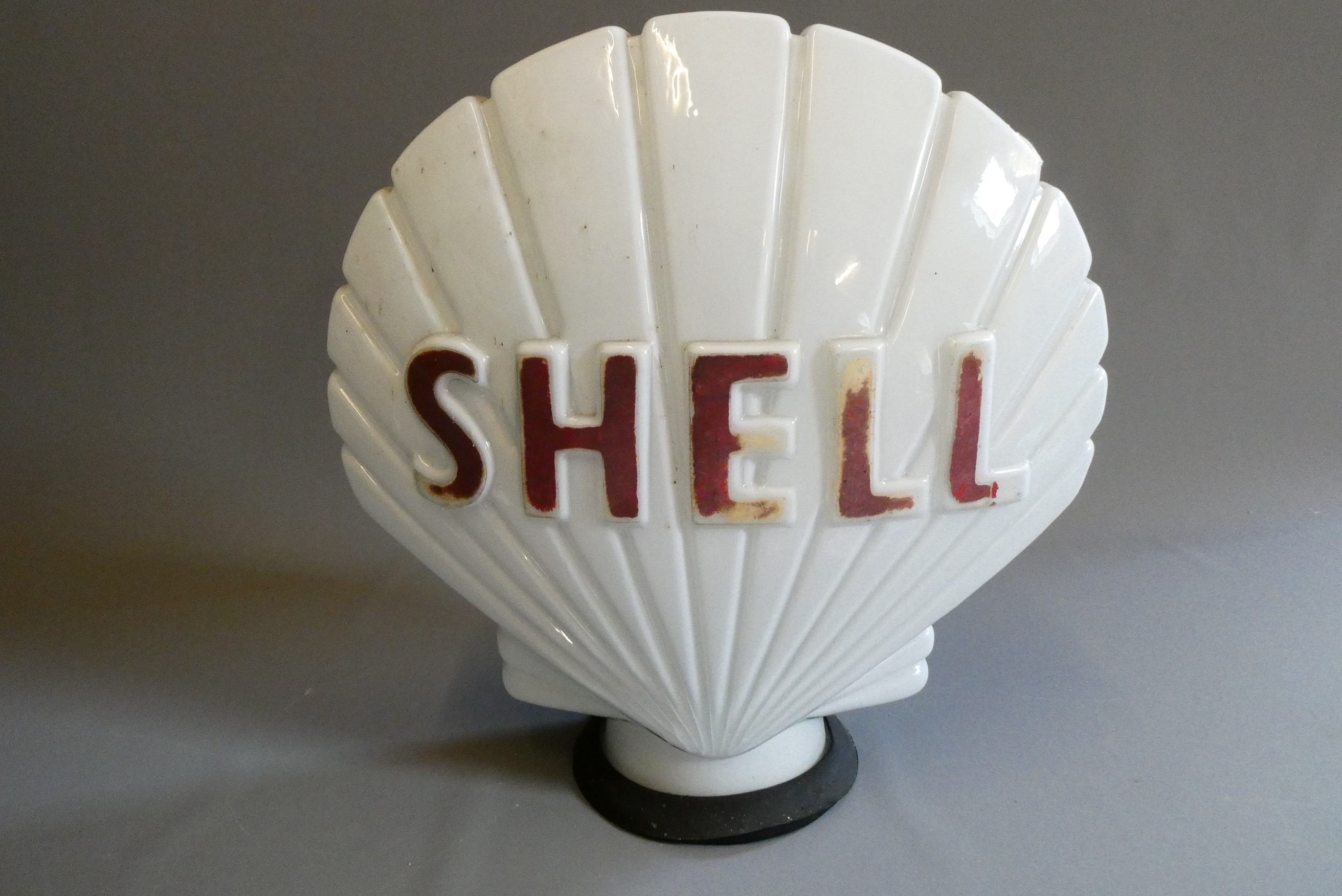 Shell petrol pump glass globe, of shell form with raised lettering, marked internally "PROPERTY OF Image