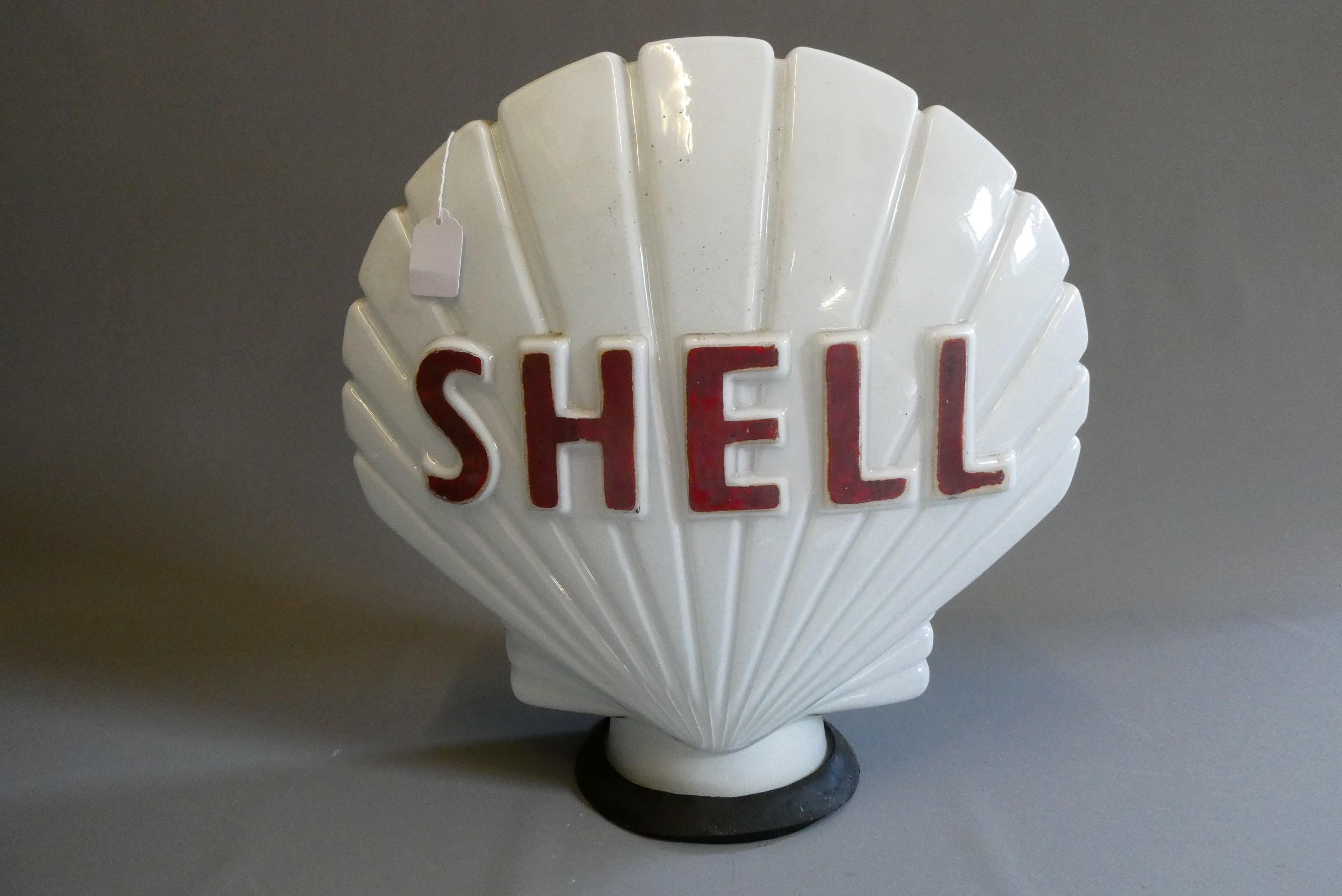 Shell petrol pump glass globe, of shell form with raised lettering, marked internally "PROPERTY OF Image