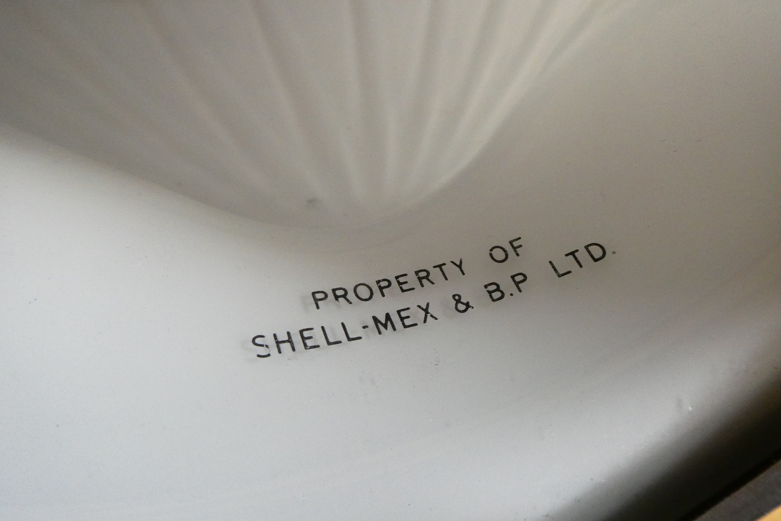 Shell petrol pump glass globe, of shell form with raised lettering, marked internally "PROPERTY OF Image