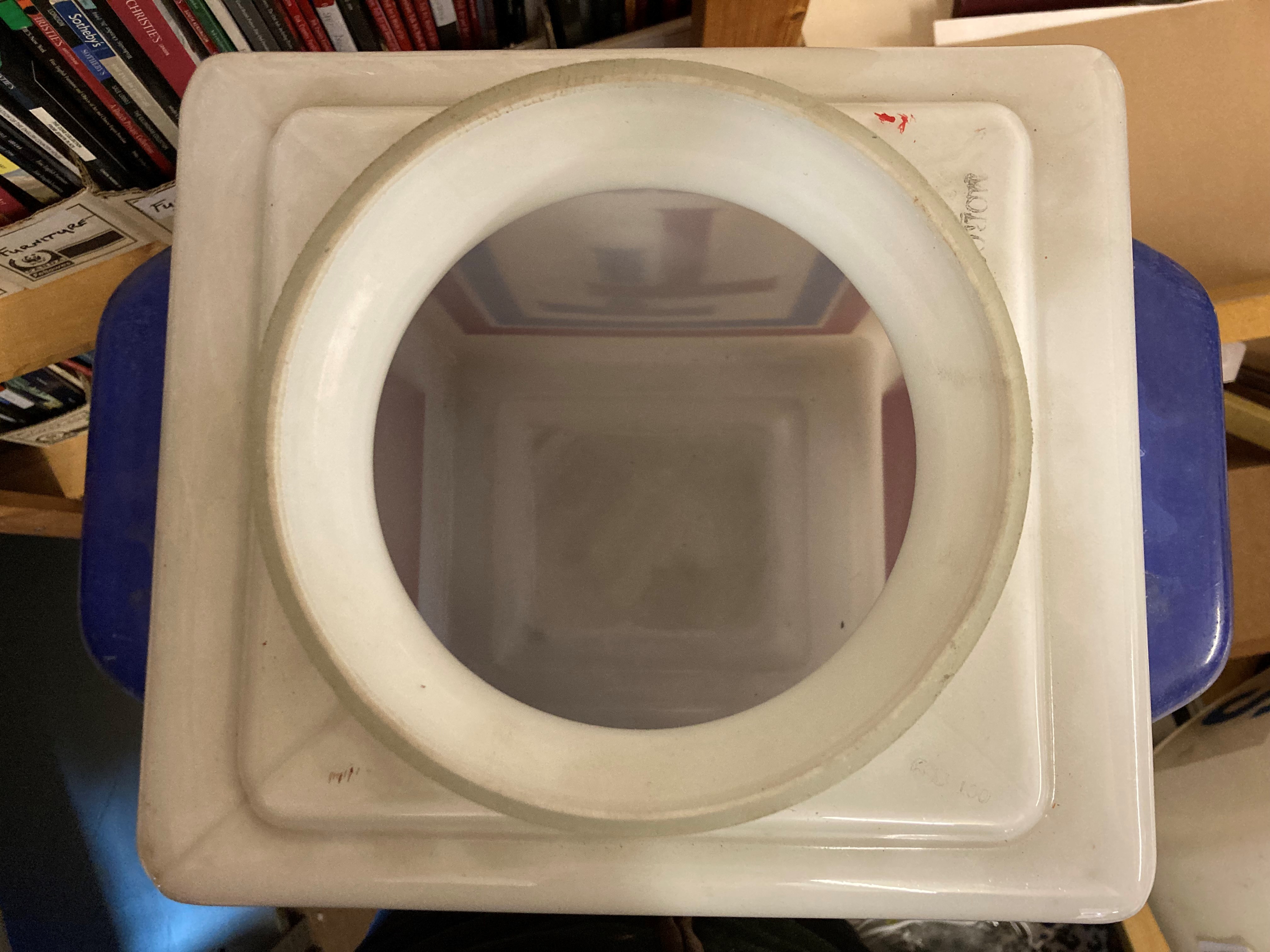 Regent TT petrol pump glass globe, of cuboid form with red and blue colouring, stamped "MORCO" AND Image