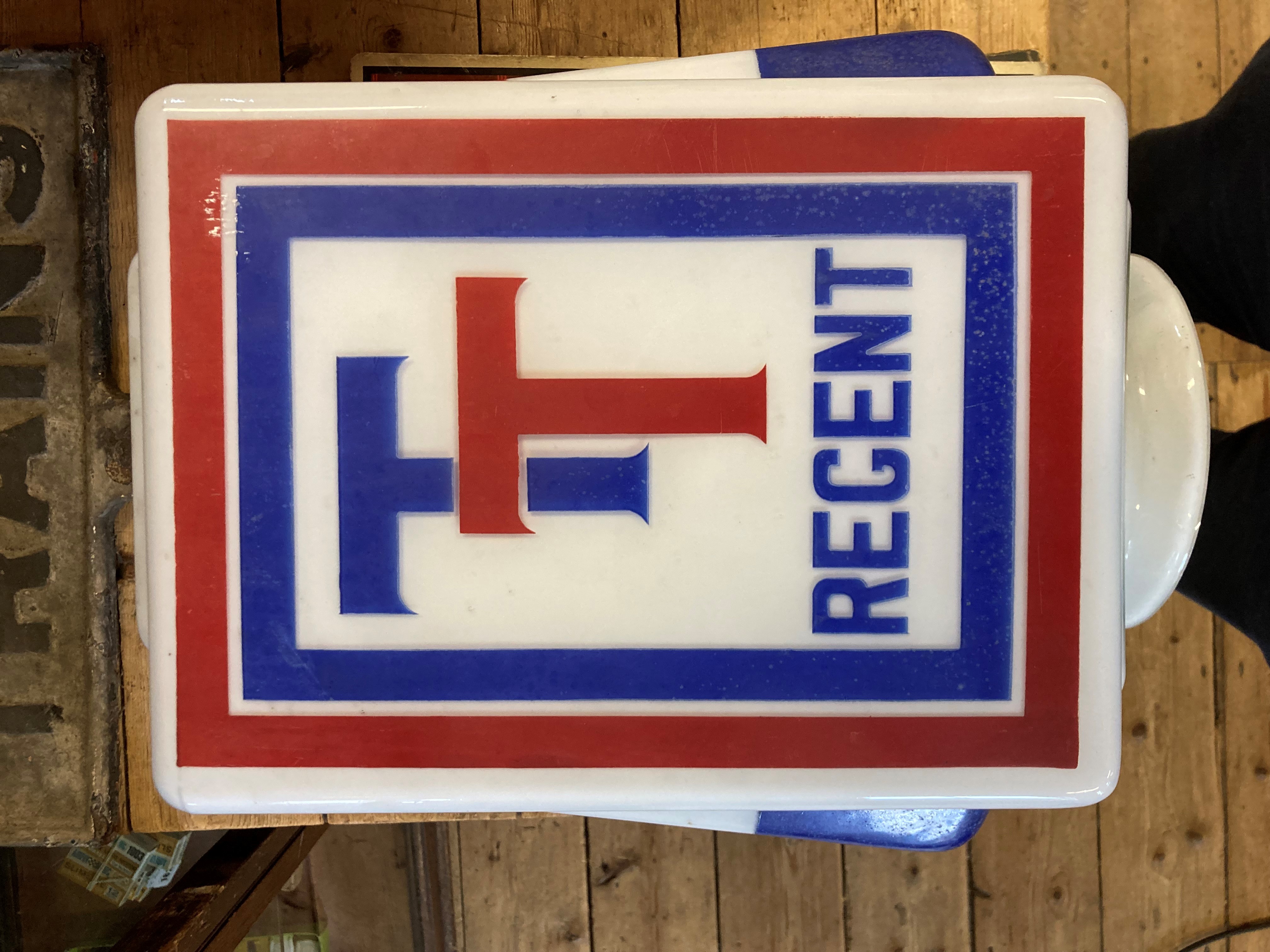 Regent TT petrol pump glass globe, of cuboid form with red and blue colouring, stamped "MORCO" AND Image