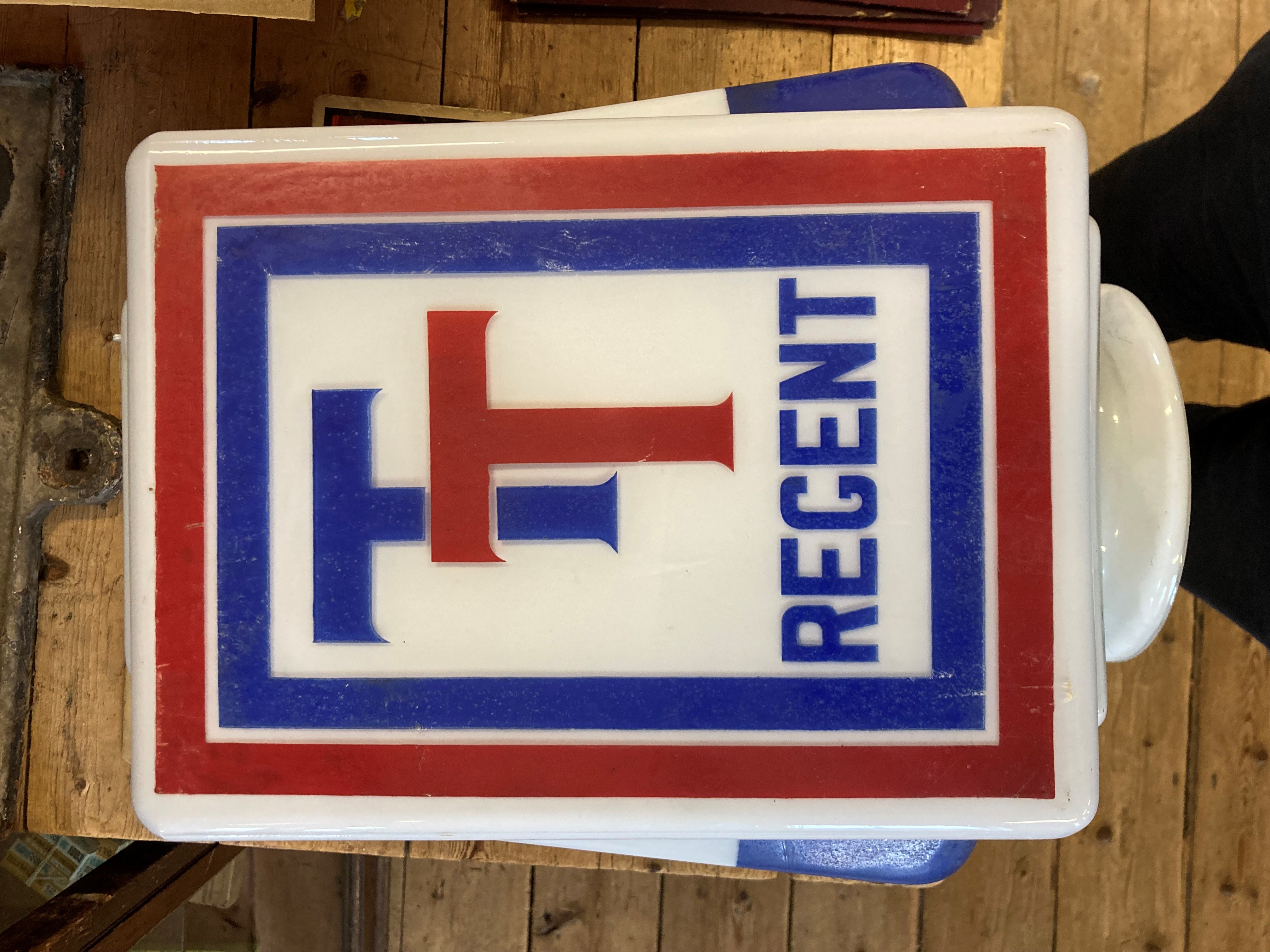 Regent TT petrol pump glass globe, of cuboid form with red and blue colouring, stamped "MORCO" AND Image