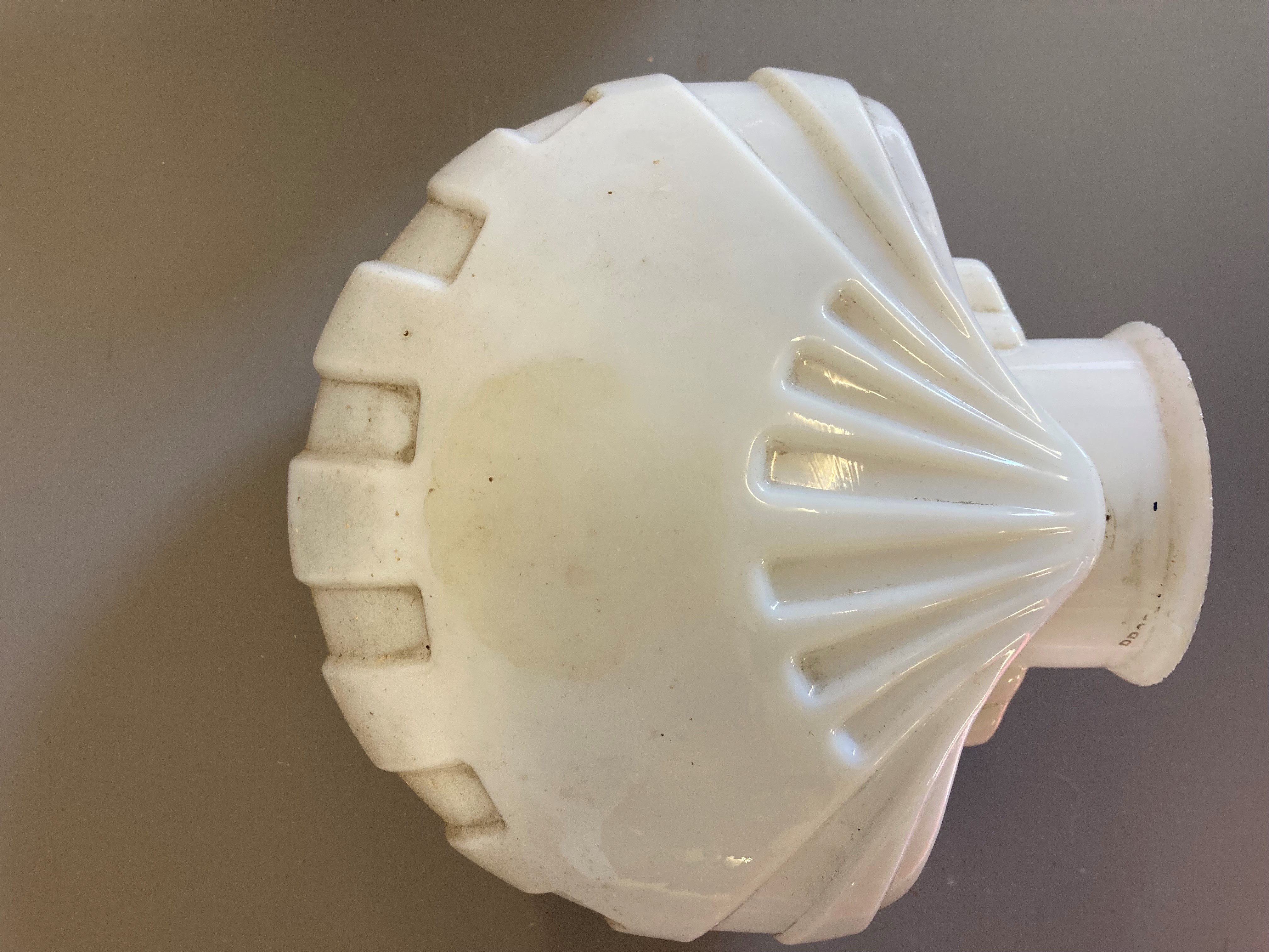 Four small petrol pump type glass globes, including two Shell examples, minor faults to three, Image