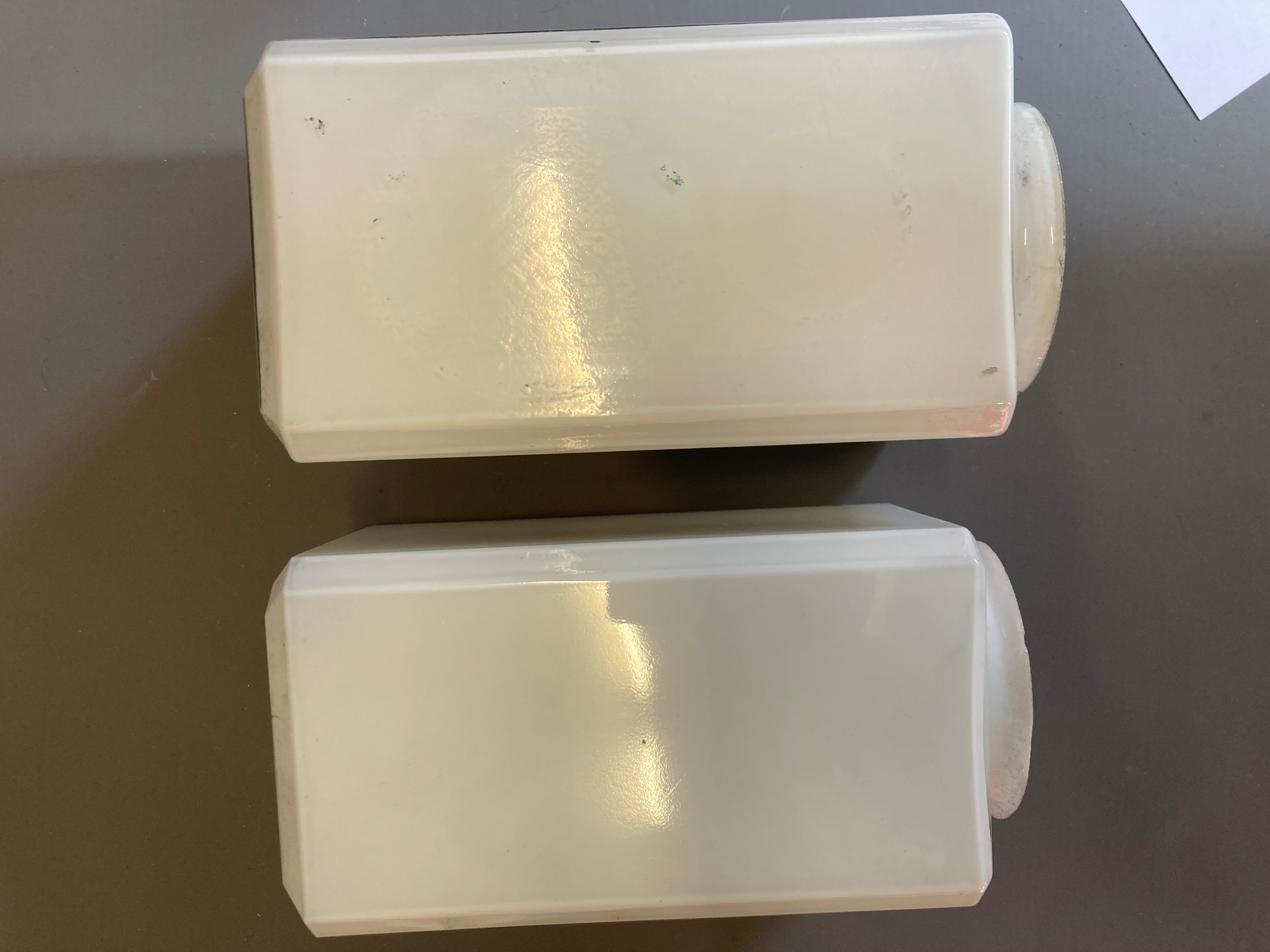 Four small petrol pump type glass globes, including two Shell examples, minor faults to three, Image