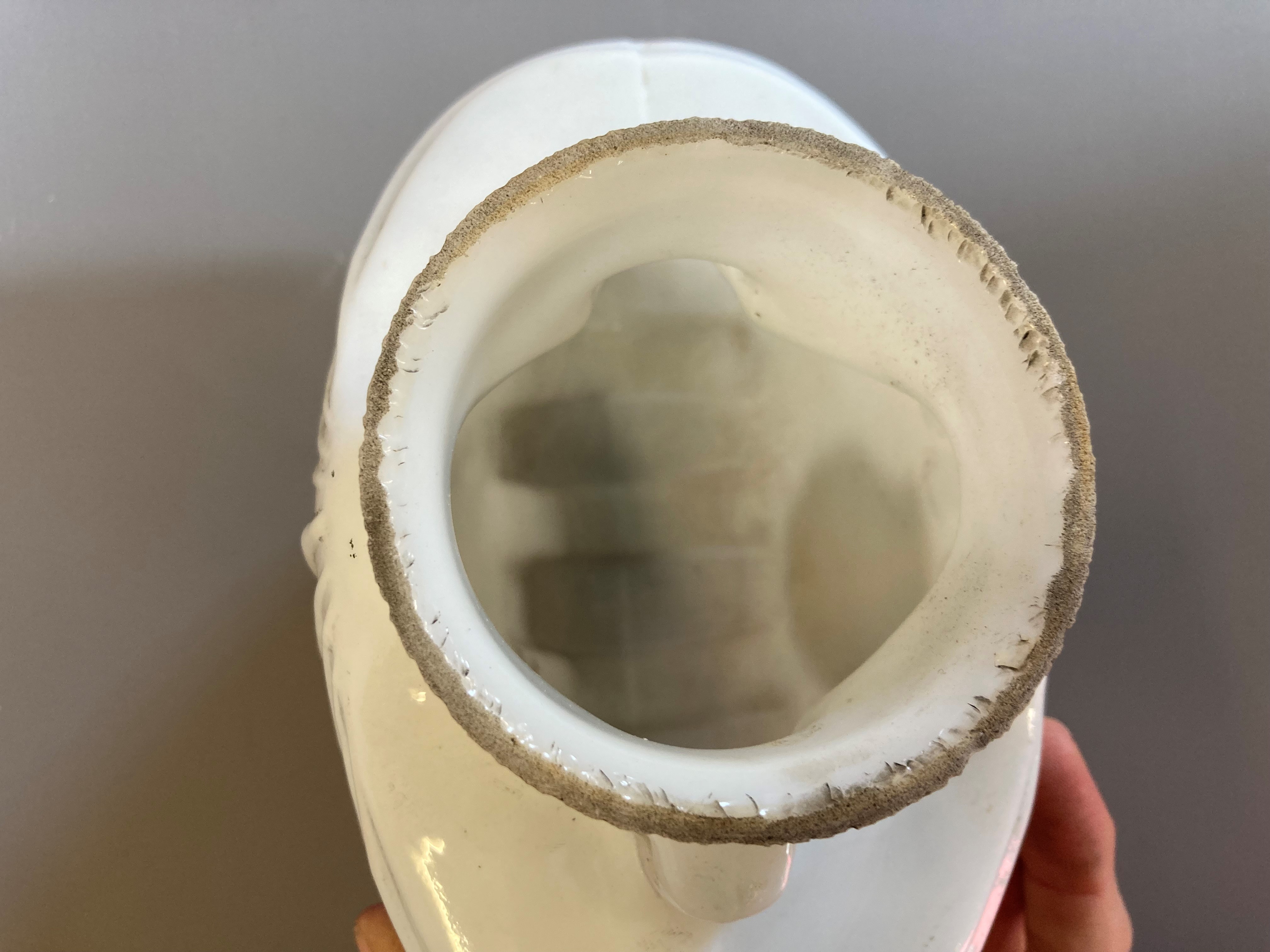 Four small petrol pump type glass globes, including two Shell examples, minor faults to three, Image