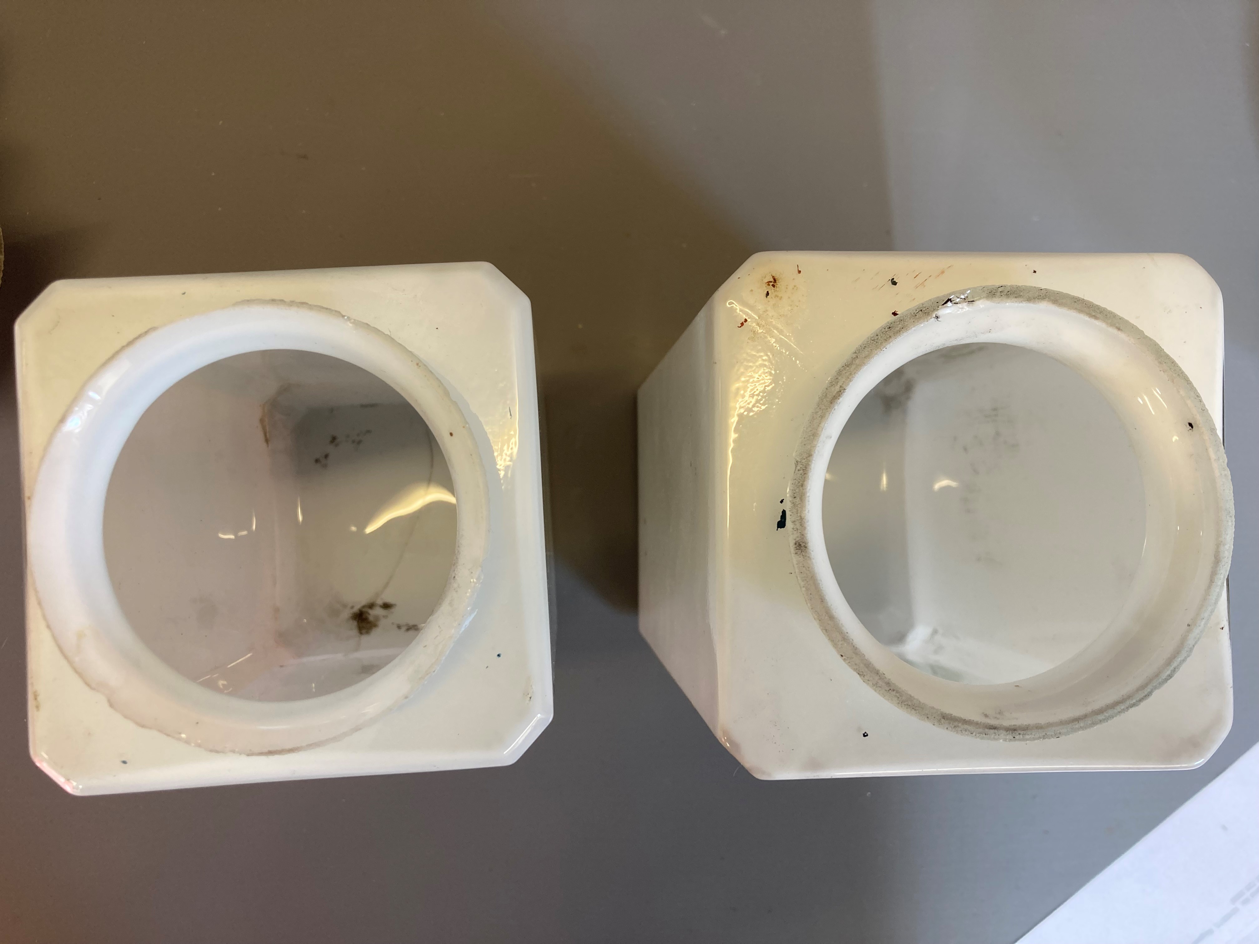 Four small petrol pump type glass globes, including two Shell examples, minor faults to three, Image