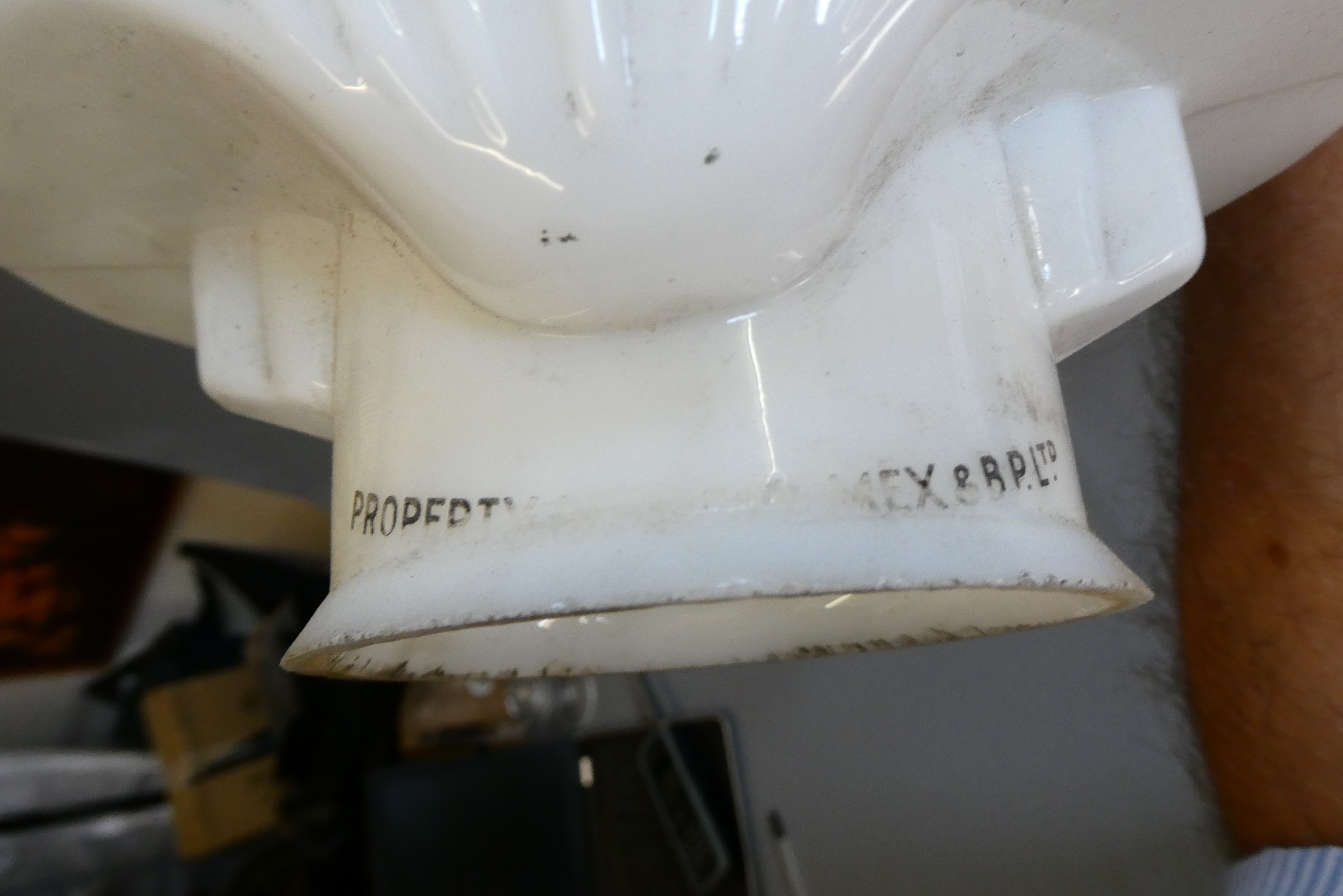 Four small petrol pump type glass globes, including two Shell examples, minor faults to three, Image