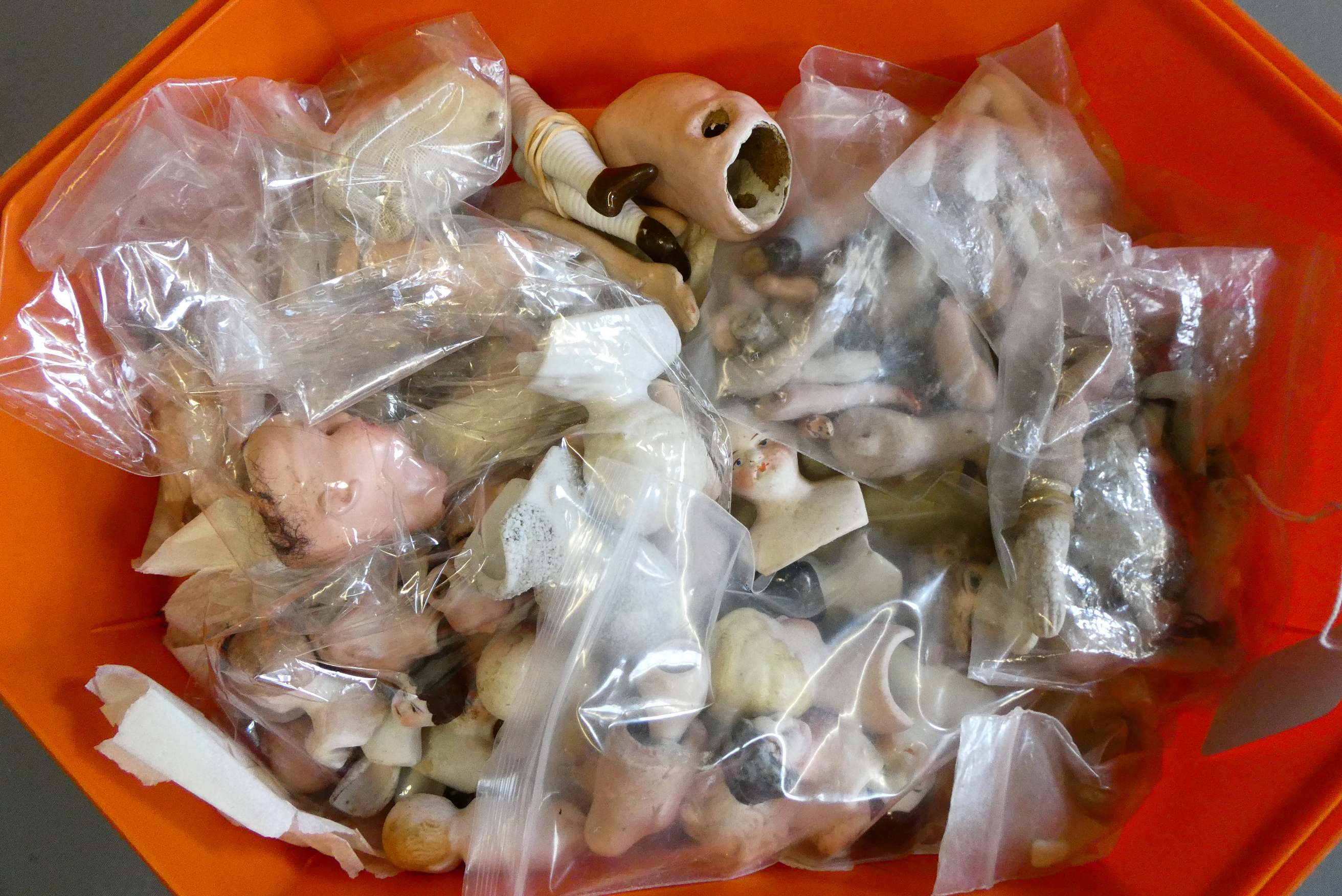 Approximately 40 antique doll's house doll heads and body parts (Est. plus 24% premium inc. VAT) Image