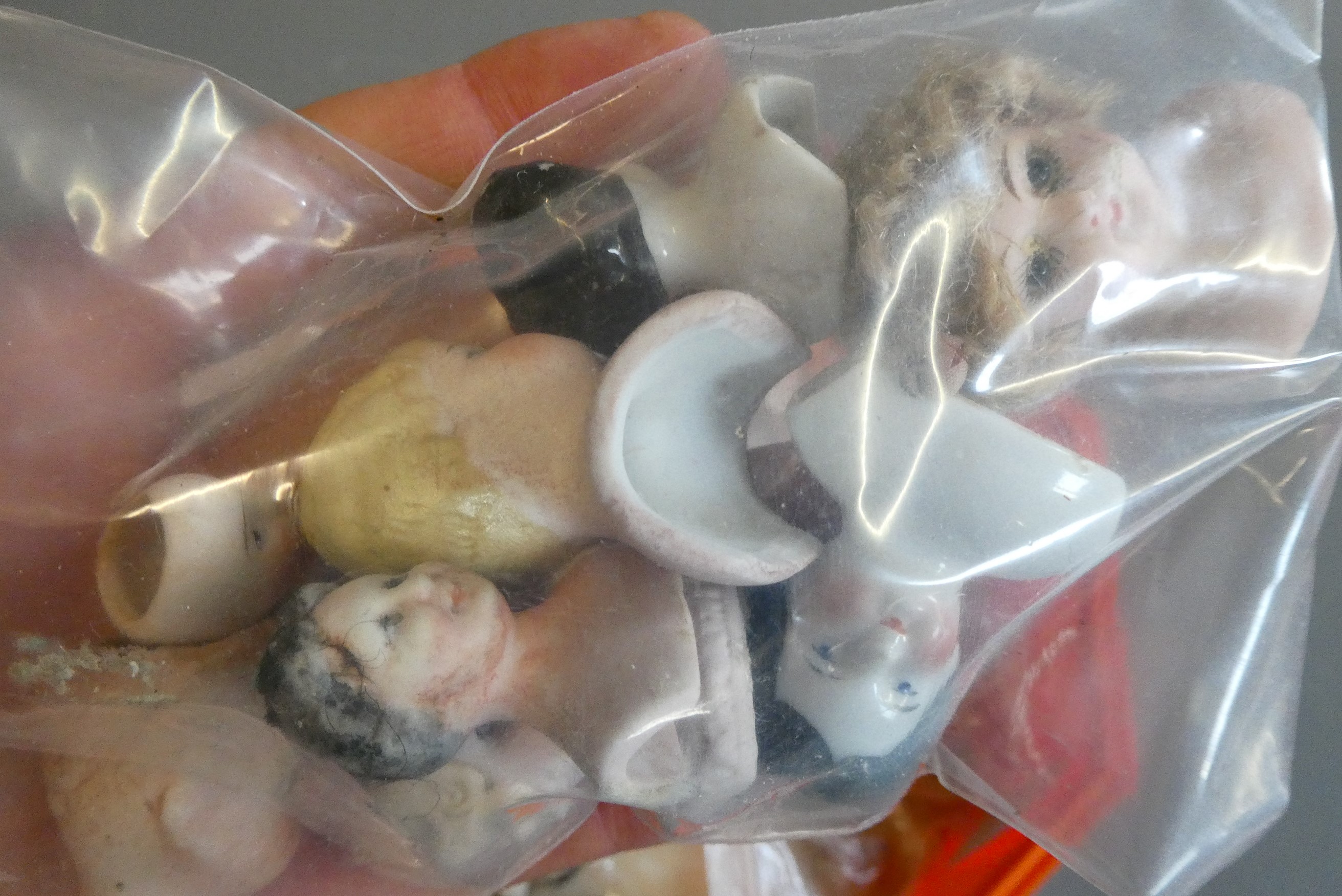 Approximately 40 antique doll's house doll heads and body parts (Est. plus 24% premium inc. VAT) Image