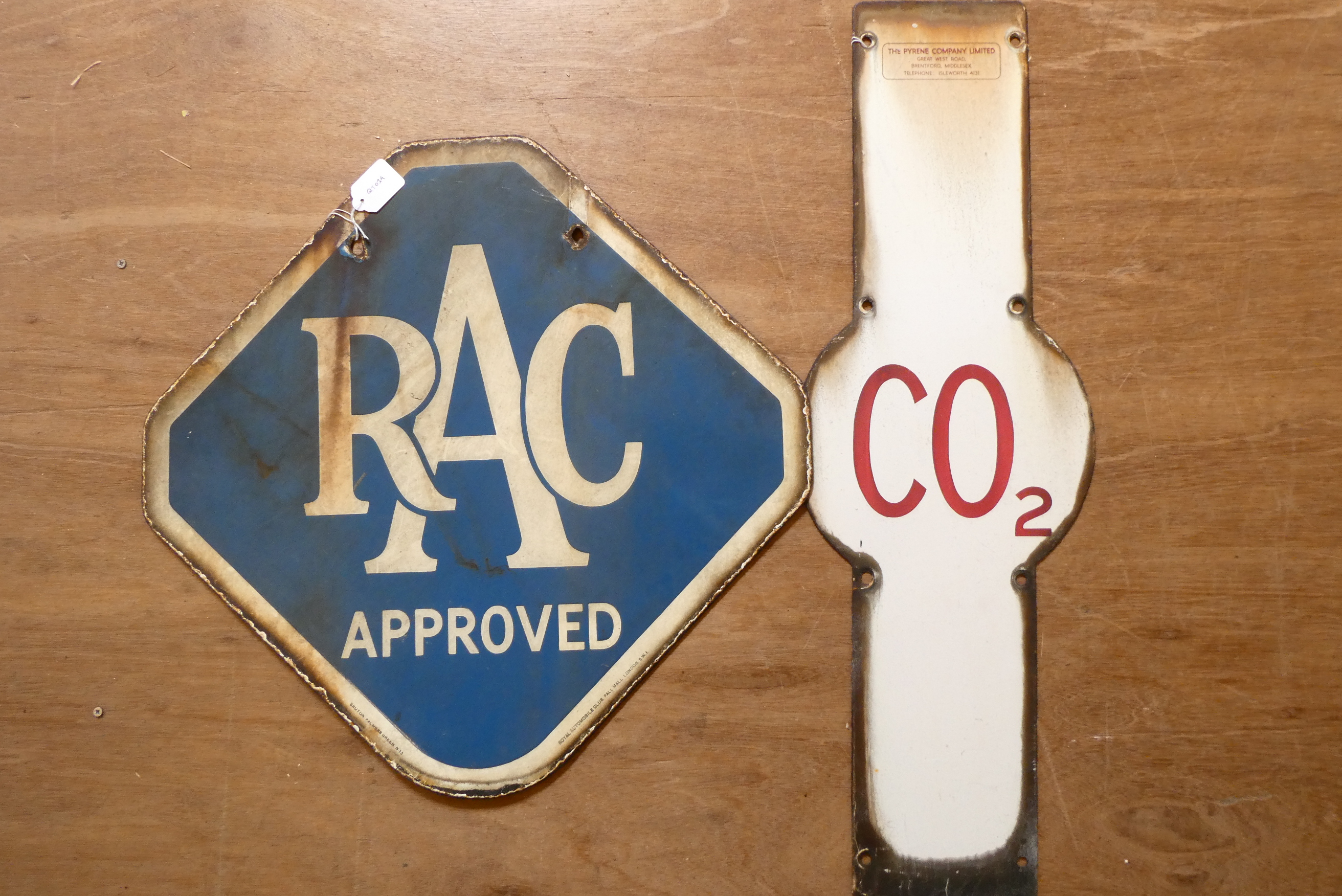 Two enamel signs, comprising a 22 5/8" RAC diamond shaped sign and a 30" CO2 warning sign by The Image