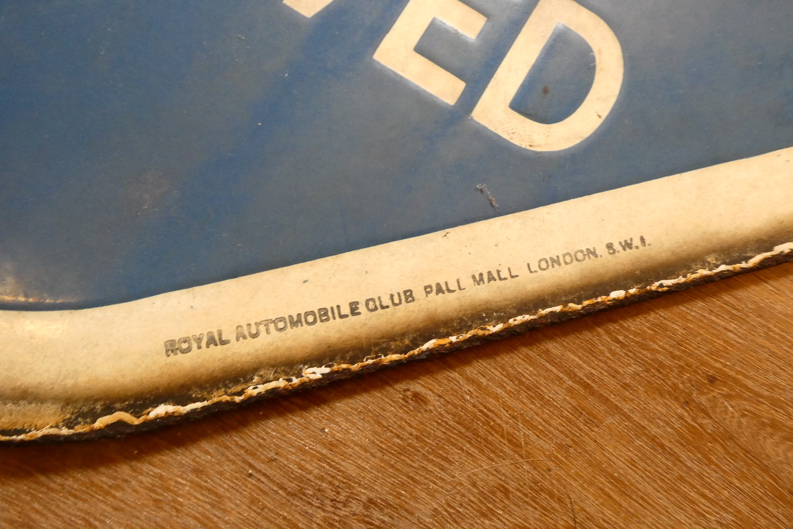 Two enamel signs, comprising a 22 5/8" RAC diamond shaped sign and a 30" CO2 warning sign by The Image