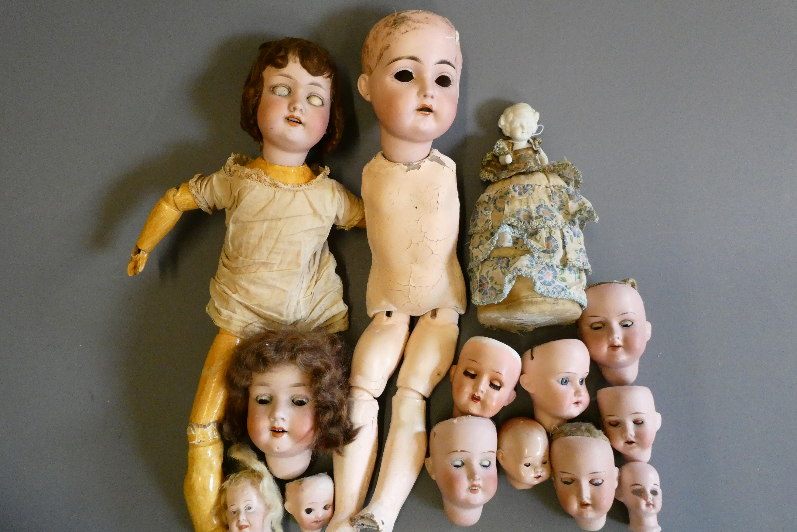 An assortment of doll's and doll parts Image