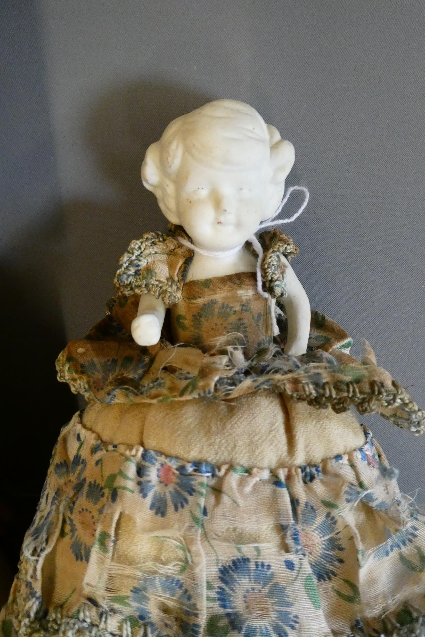 An assortment of doll's and doll parts Image