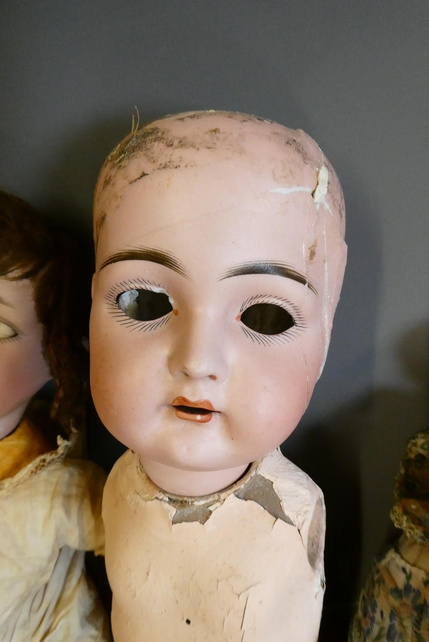 An assortment of doll's and doll parts Image