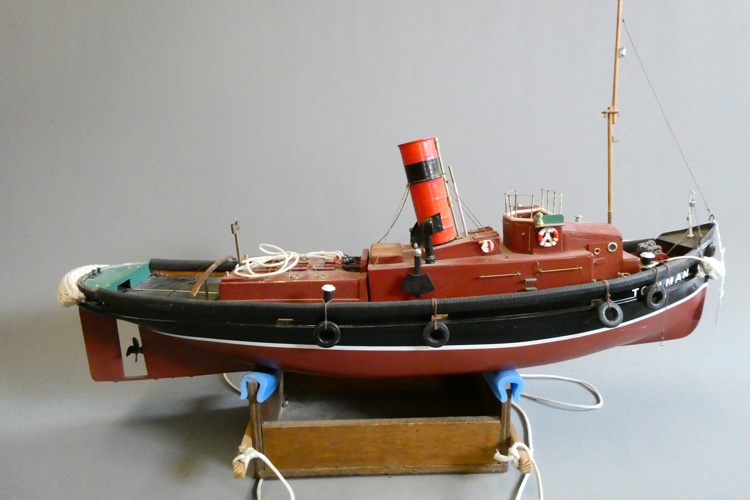 An electric motorised tugboat "Tollman" Image